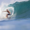 8. Surfing a barrel in Bali