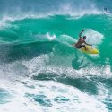 91. Catching a big wave in Bali