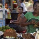 6. Balinese woman at Ubud market stall